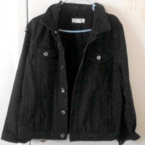 Black denim distressed jean jacket.